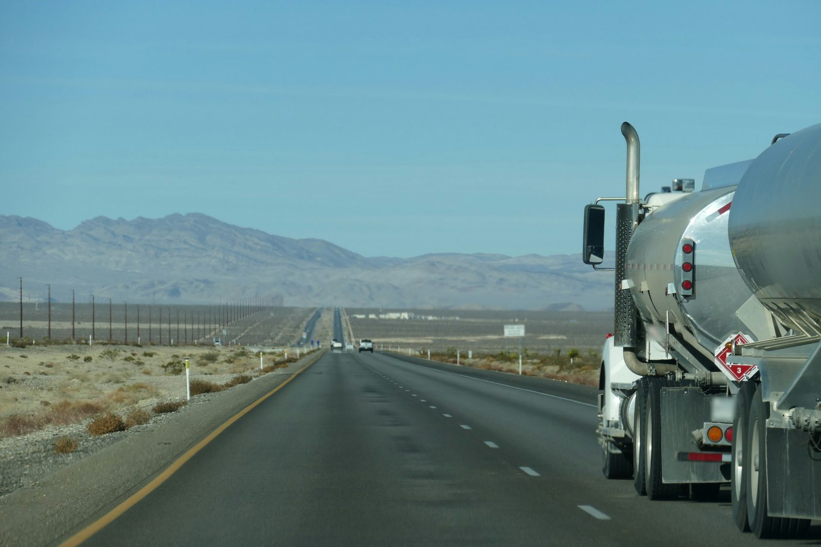 A tanker truck on a desert highway