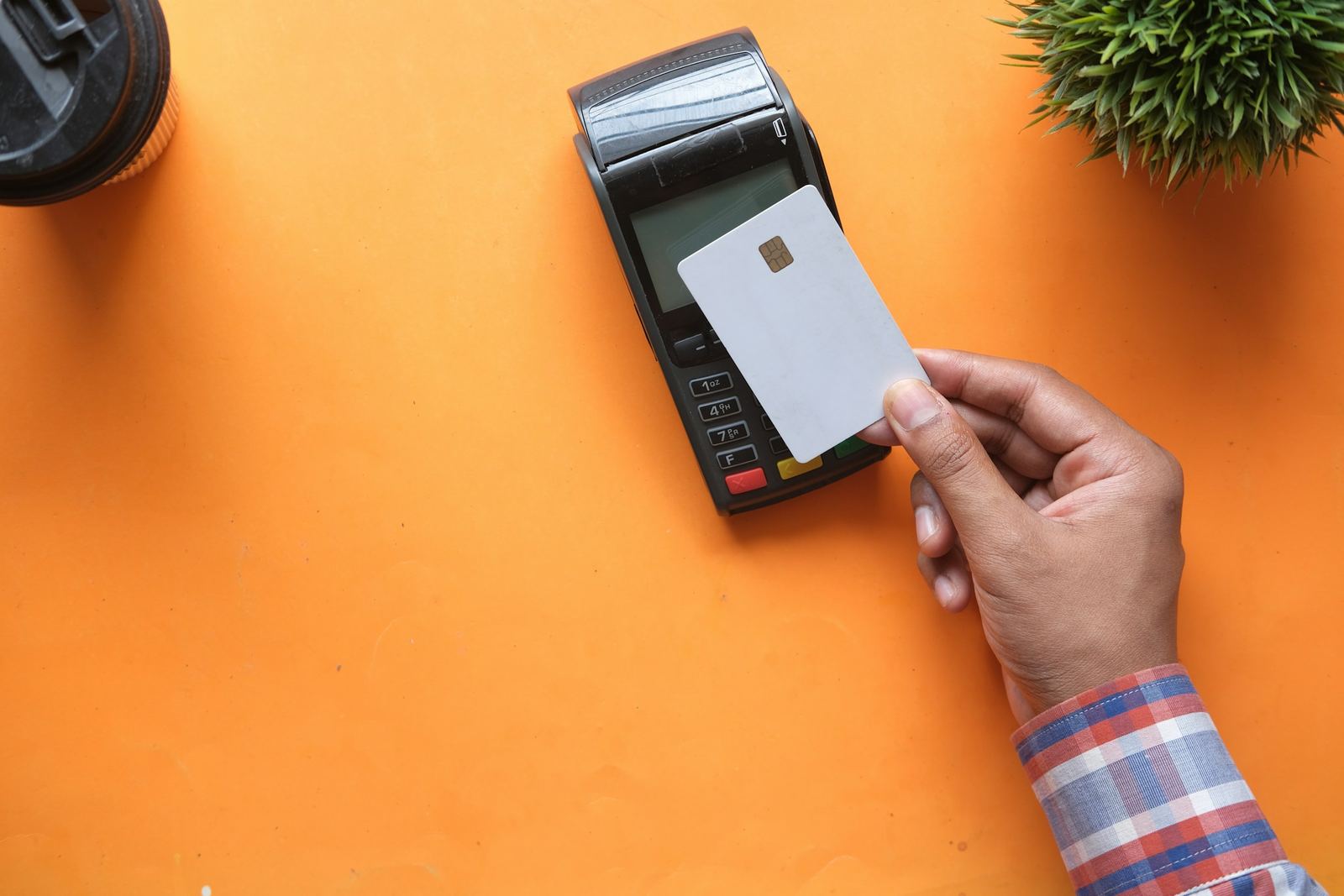 A card being tapped on a payment terminal